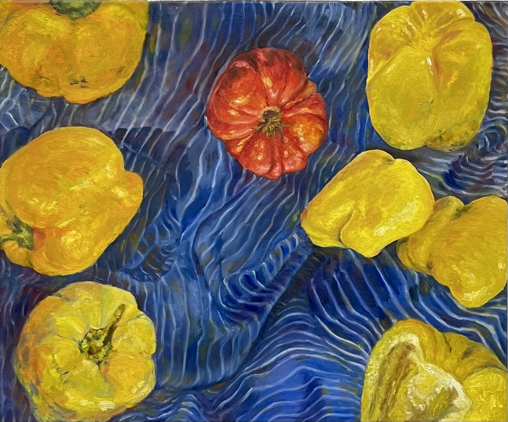 painting of peppers and tomato on blue fabric