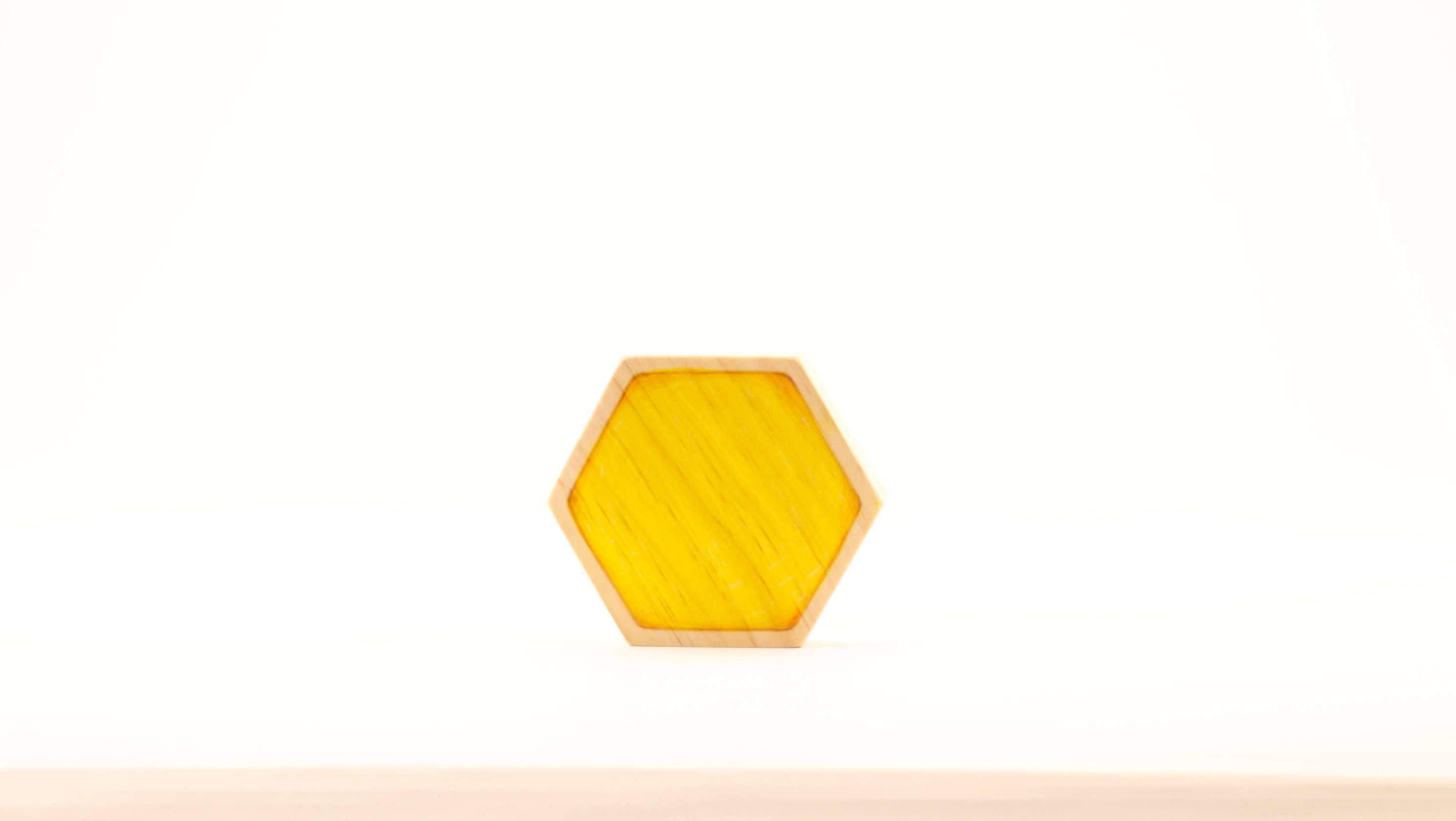 single wood hexagon block, yellow, non colored border